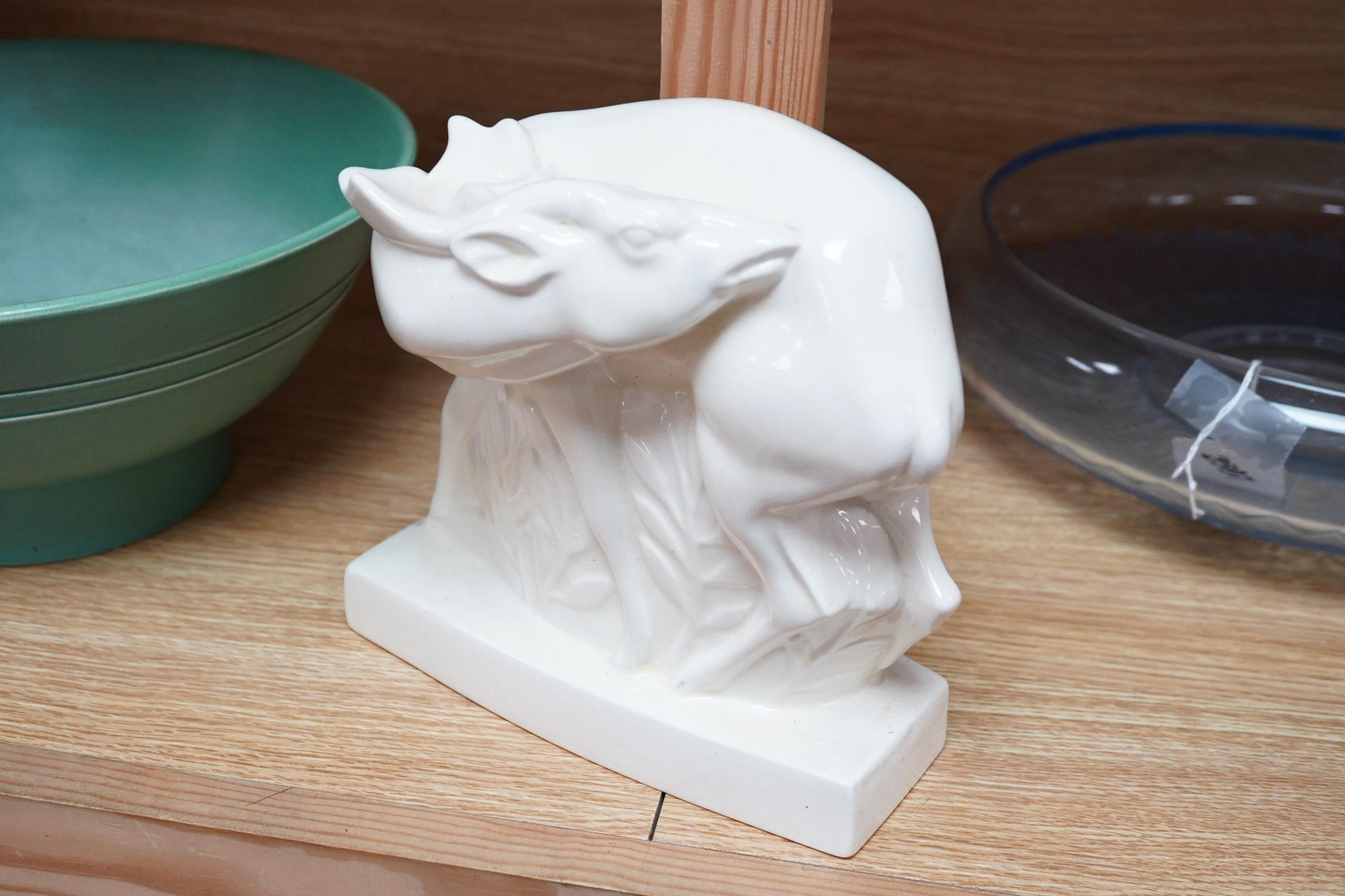 John Skeaping for Wedgwood, an Art deco Fallow deer, cream glazed, 20cm high